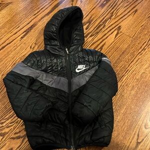 Nike boys jacket, size 6.  Black w/gray stripes and fleece lining.